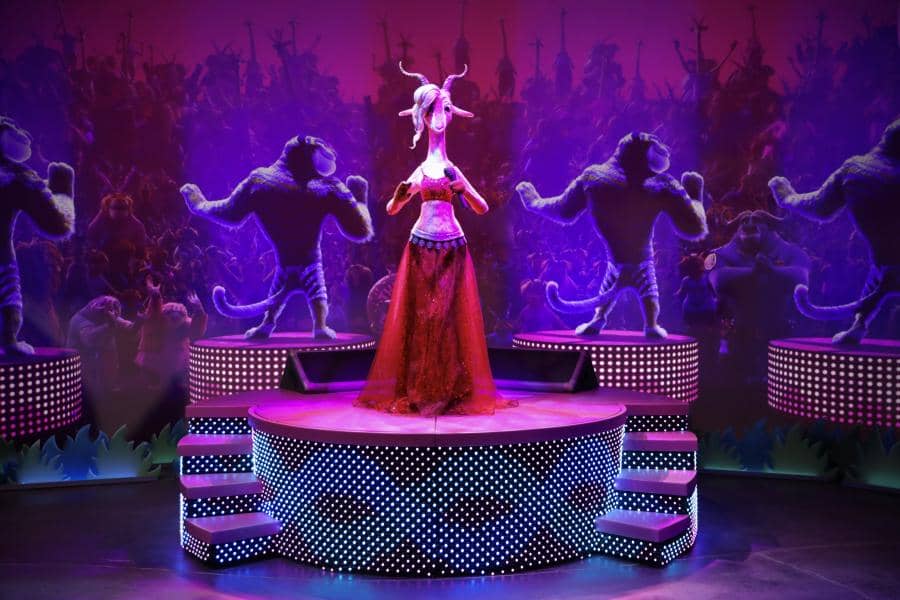 Animatronic of Gazelle from Zootopia with tigers as back-up dancers projected behind an LED screen